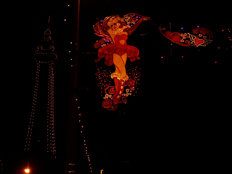 Photo - Cupide illuminated with Blackpool Tower lit up in the background - Erection and Switch-On - Making of a Blackpool Illumination - &copy; Sarah Myerscough