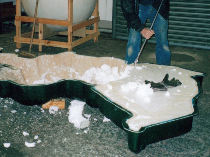 Photo - One of the Illuminations staff digging out the polystyrene and plaster - Moulding and Casting - Making of a Blackpool Illumination - &copy; Sarah Myerscough