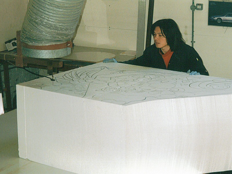 Photo - Shoichi Yasuda using a hot wire to cut out the outline from the polystyrene - Drawing and Carving - Making of a Blackpool Illumination - © Sarah Myerscough