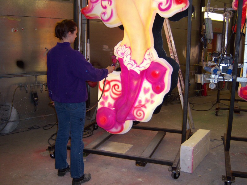 Photo - Sarah Myerscough (me) working on Cupide with a spray gun - Painting - Making of a Blackpool Illumination - © Sarah Myerscough