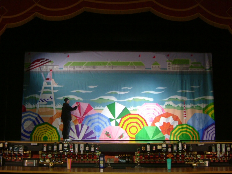 Photo - Yours truly painting the beach scene backdrop - Funny Girls 2006 - Misc Works Gallery - © Sarah Myerscough